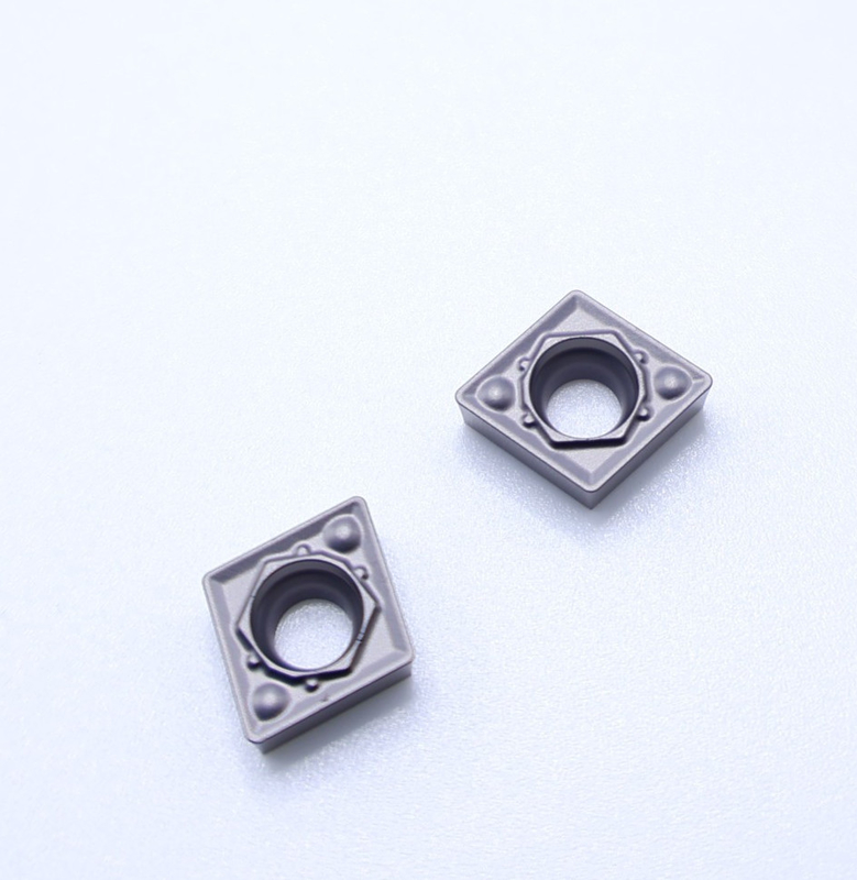 Pieza de trabajo de acero al carbono CCMT060204-1HQ MC3015 inserciones de herramientas de corte de cermet con resistencia a las fracturas y superficie lisa