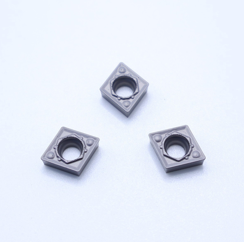 Superficie lisa MC5015 grado CCMT060204-1HQ inserciones de herramientas de corte de cermet con buena resistencia a la fractura